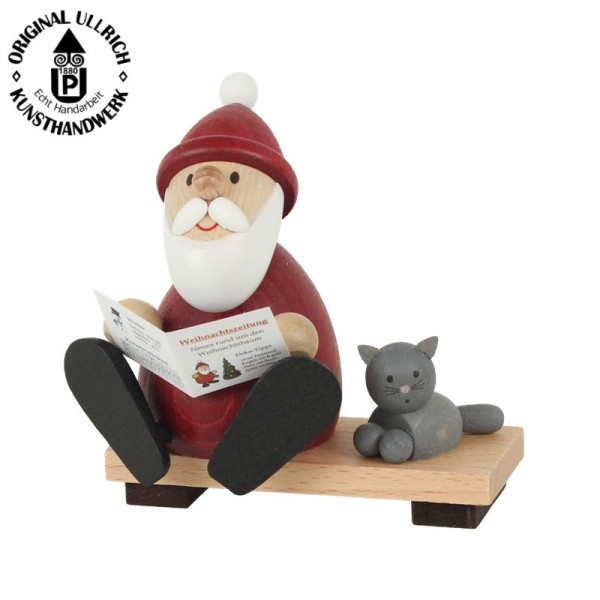 Weihnachtsmann modern auf Bank mit Zeitung & Katze H 9,0cm , ULLRICH® Kunsthandwerk